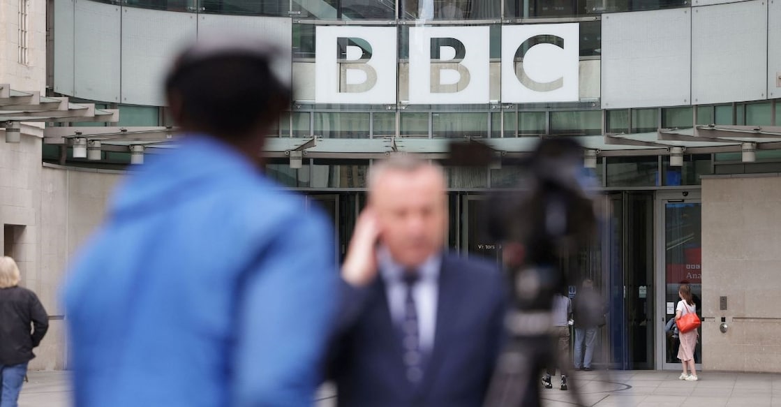 Journalists report outside BBC headquarters in London. Photo: Reuters