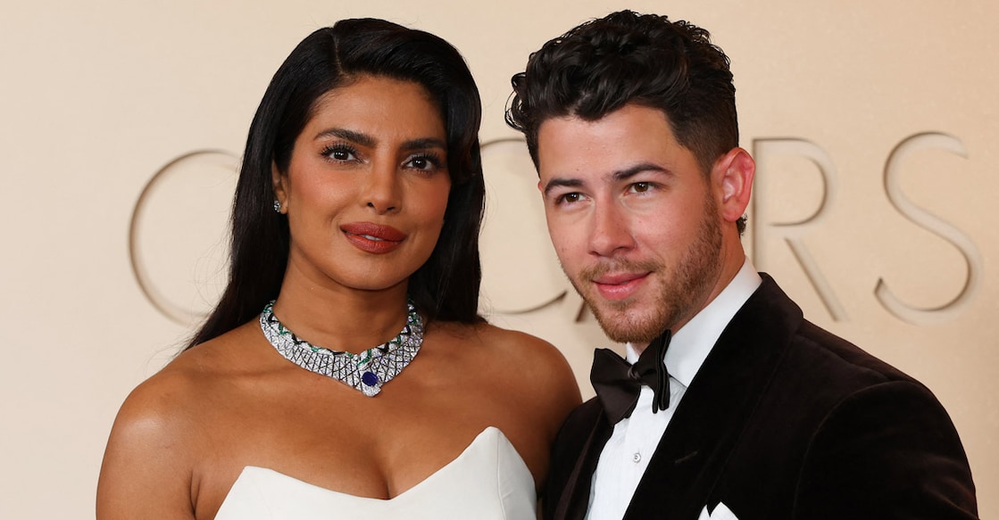 Priyanka Chopra posing with Nick Jonas at the Oscars red carpet. Photo: AFP