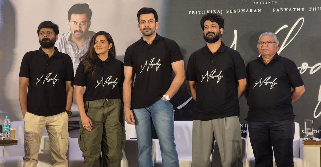 Prithviraj Sukumaran and Parvathy Thiruvothu with 'I, Nobody' director Nissam Basheer, writer Sameer Abdul and producer Mukesh Mehta. Photo: Onmanorama