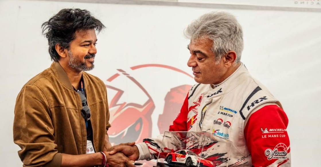 Tamil Nadu CM Vijay gifting Ajith a miniature racing car, personally signed and gifted with a heartfelt note. Photo: X/ ActorVijayTeam