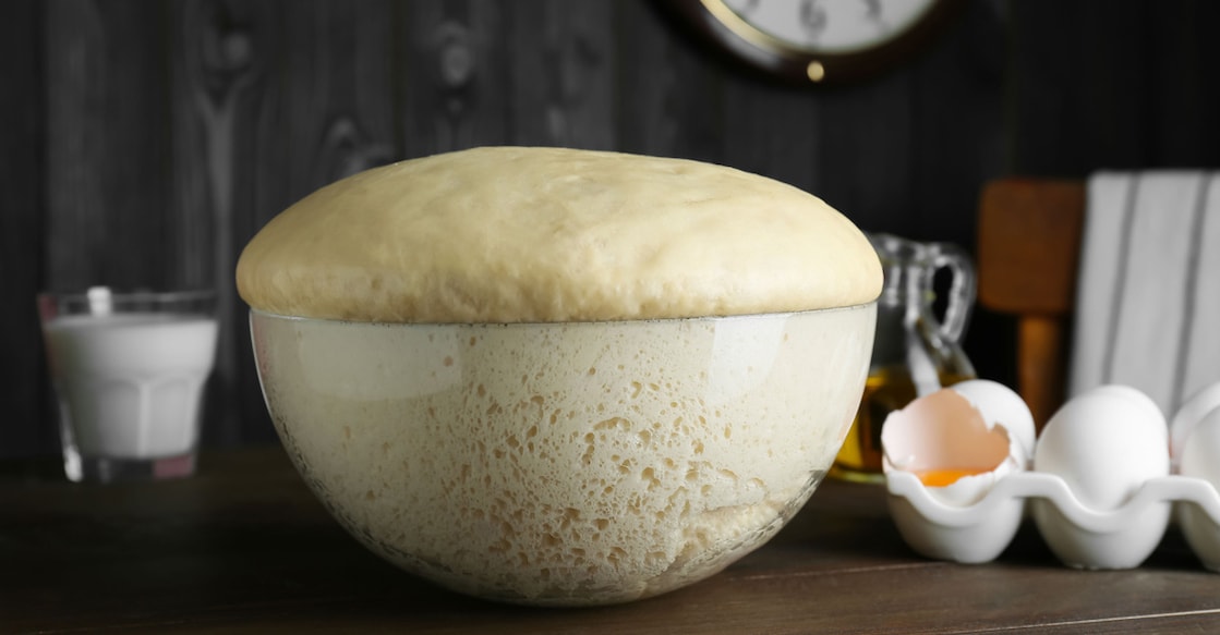 Yeast-fermented dough rising as trapped carbon dioxide causes it to expand before baking. Photo: Shutterstock/New Africa