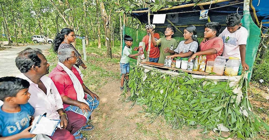 At their summer stall, ‘Magesh and the kids’, the young team shakes up glasses of kulukki sarbath as they raise funds for football jerseys. photo: Manorama