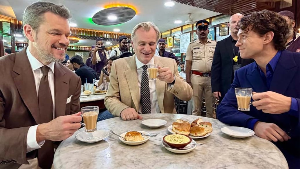 Matt Damon, Christopher Nolan and Tom Holland having chai at Mumbai's Olympia Coffee House. Photo: Instagram @universalpicturesindia
