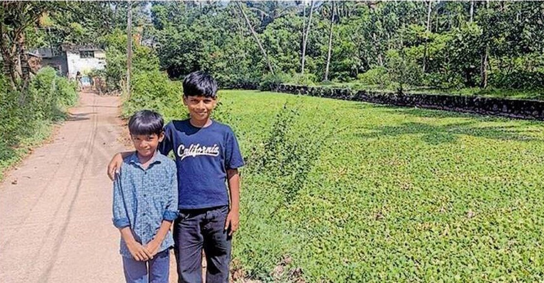 Saidali and Raman standing near Erathu Chira, the site of the rescue. Photo: Manorama