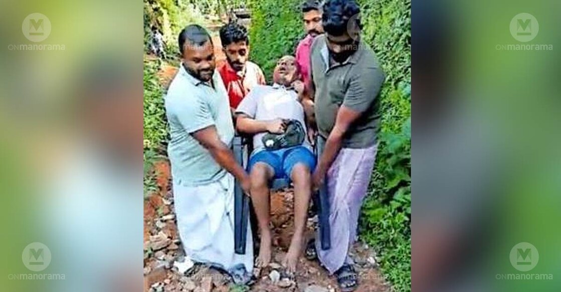 Najmal being carried on a chair to go to the hospital. Photo: Special arrangement