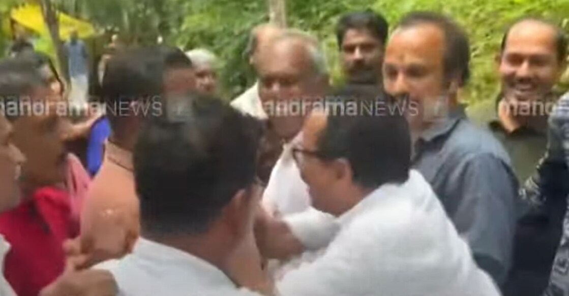 A screengrab showing MLA KP Mohanan being manhandled. Photo: Manorama News