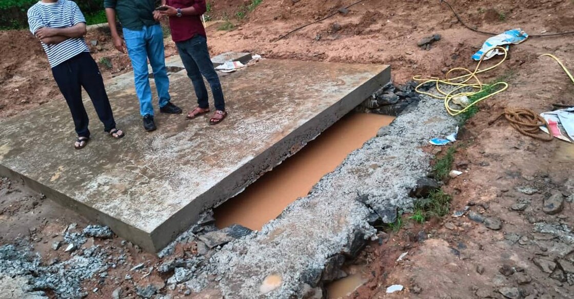 The concrete tank, dug into the ground, was filled with rainwater, and the surrounding area was also heavily waterlogged due to continuous rainfall. Photo: Special Arrangement. 