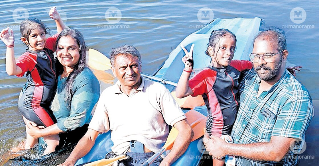 Twin sisters Nivedya and Niharika celebrate their victory with their parents, Anu and Hareesh, and coach Biju Thankappan. Photo: Manorama