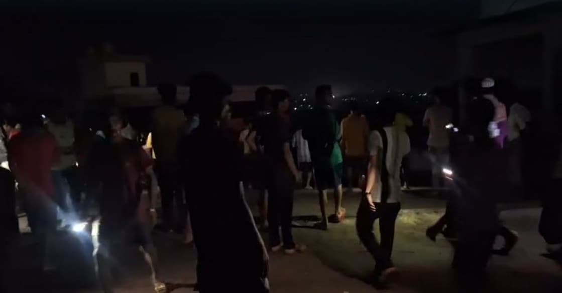Residents gather at the site of the explosion. Photo: Screengrab/Special Arrangement.