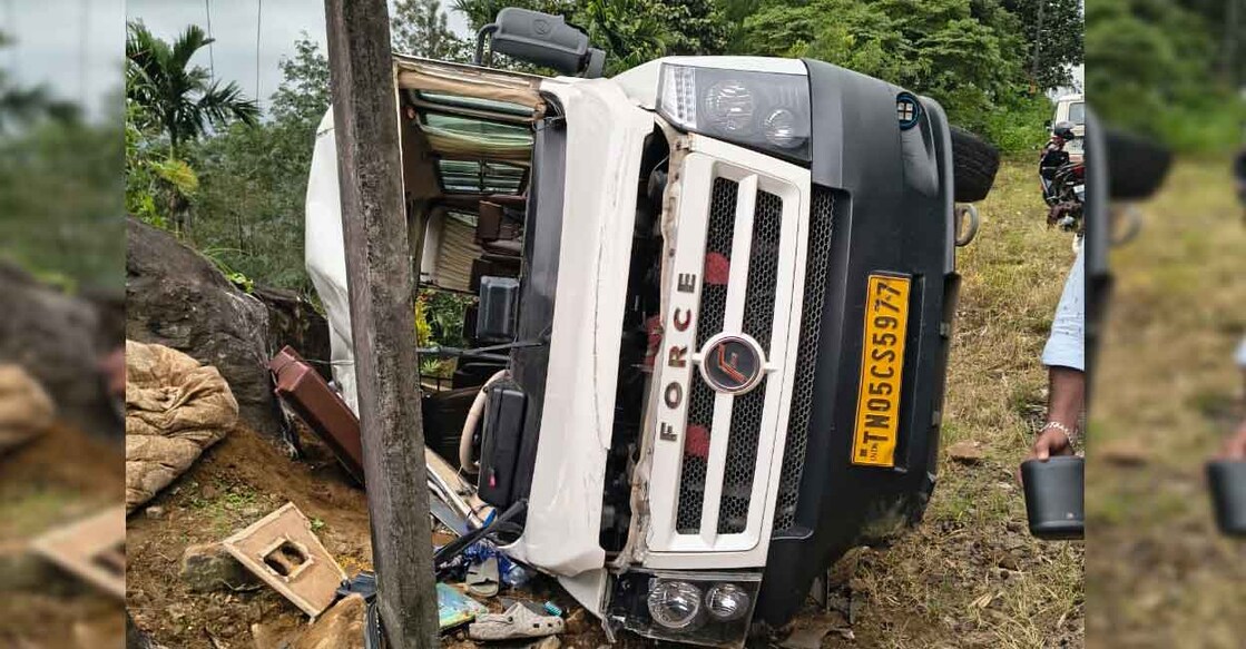 The overturned tourist traveller van near Chathanpara on the Kanjiyar–Pullikanam road. Photo: Special arrangement
