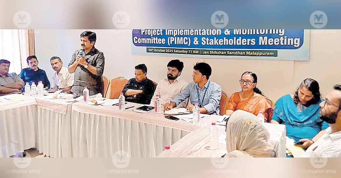 MLA Aryadan Shoukath addresses the high-level meeting for the comprehensive tribal development project being implemented jointly by JSS and NABARD in Pothukallu Panchayat. MP P V Abdul Wahab is also present nearby. Photo: Special arrangement