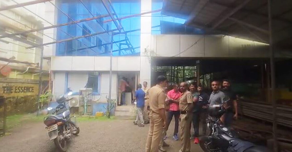 The police team at the steel dealer where the robbery took place. Photo: Manorama Online