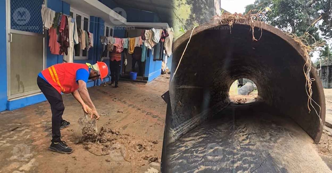 CITU Red Brigade volunteer cleans one of the flooded houses. Photo: Onmanorama