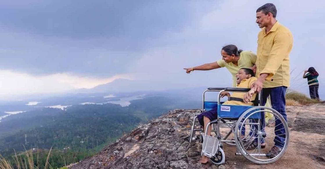 The Idam team with differently-abled students at the summit of Wayanad’s Cheengery Hills. Photo: Special arrangement