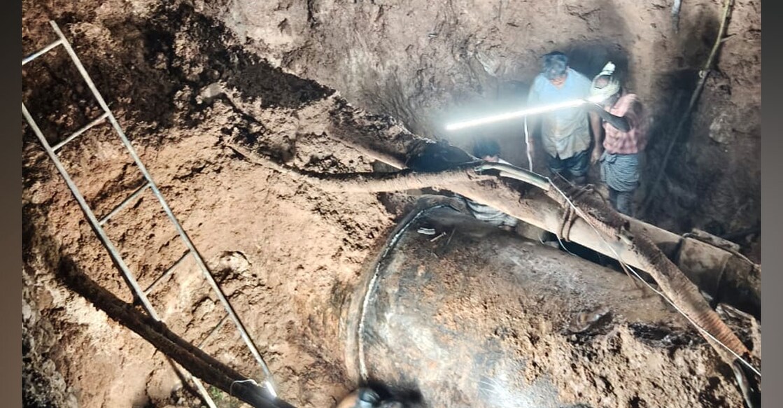 Authorities inspecting the leak. Photo: Special Arrangement
