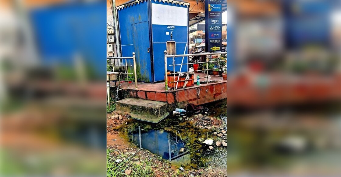  The non-functional water ATM at Kuravilangad bus stand,  surrounded by stagnant wastewater and garbage. Photo: Manorama