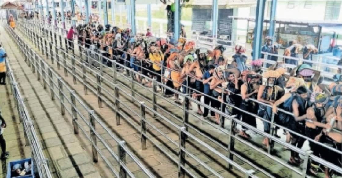 Devotees line up to have darshan at Sabarimala temple on November 20. Photo: Manorama