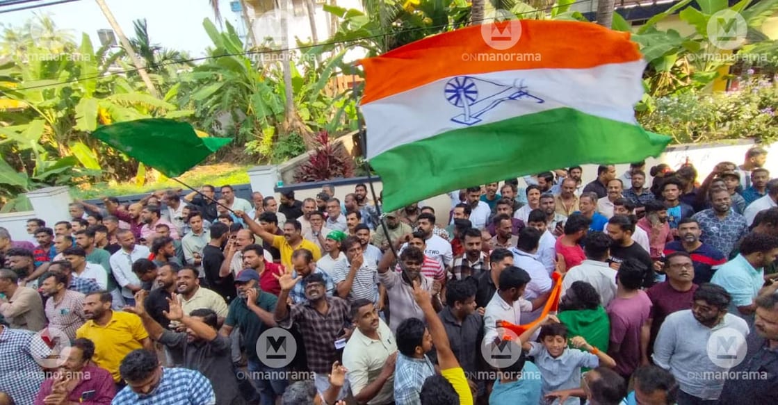 UDF workers celebrating in front of the counting centre at the Nadakkavu School. Photo: Manorama. 