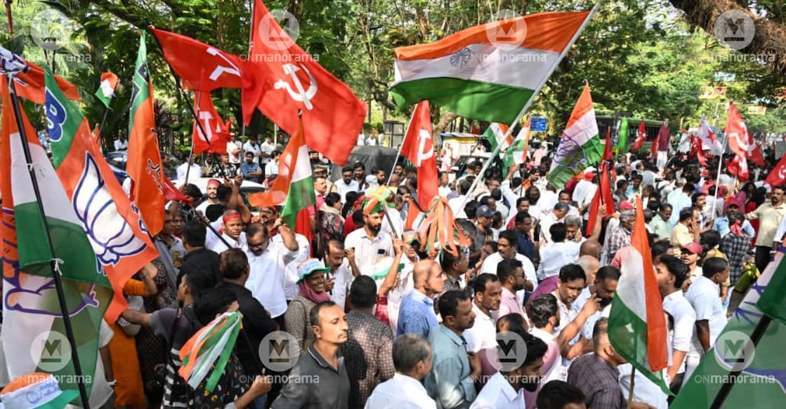 Party workers from UDF, LDF and BJP assemble outside the Maharaja's College counting centre and celebrate the results. Photo: Manorama