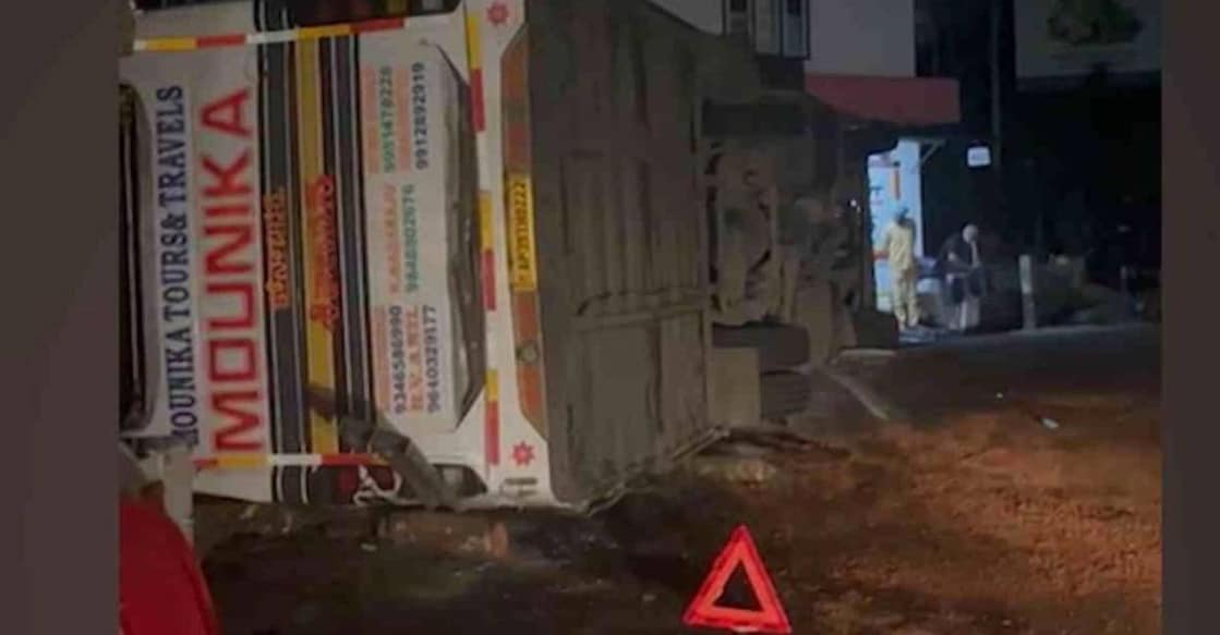Bus that overturned in Pathanamthitta leaving four Sabarimala pilgrims injured. Photo: Manorama News
