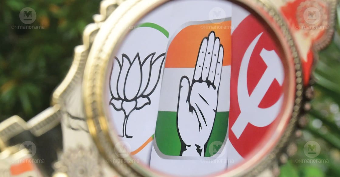 Symbols of political parties reflected in an Aranmula kannadi (mirror). File photo: Manorama
