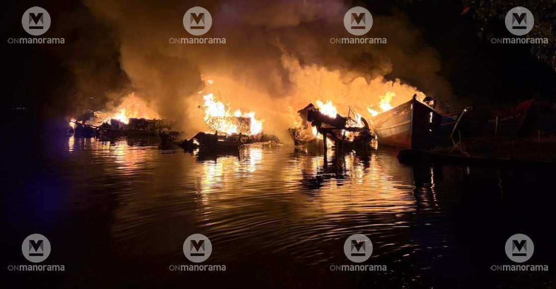 Boats which caught fire on Ashtamudi lake in Kollam. Photo: Aravind Venugopal/Manorama