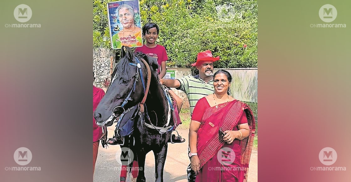 LDF candidate Celine George on the campaign trail with a horse. Photo: Manorama
