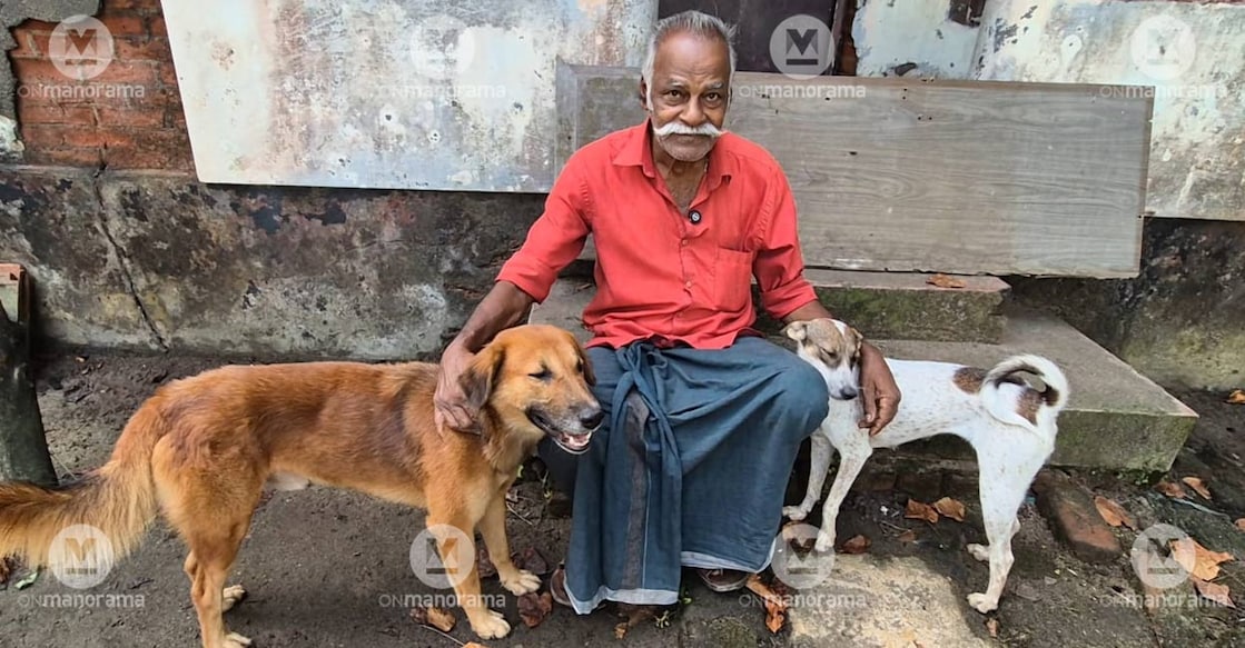 K C Joseph with his dogs. Photo: Onmanorama. 
