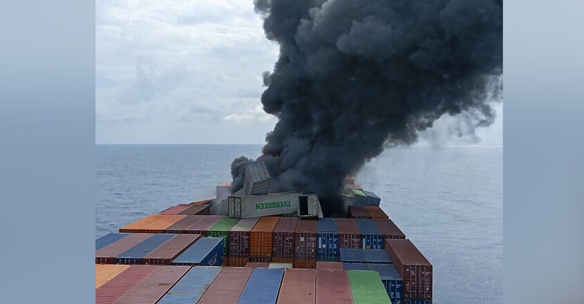 kannur-container-ship-accident Thick black smoke billows from Singapore-flagged container vessel MV WAN HAI 1503 following an explosion. Photo: PTI