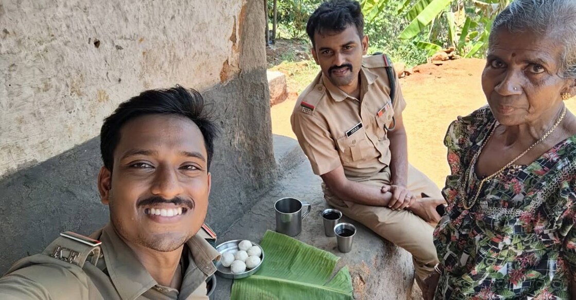 Vedavathi with the forest officials. Photo: Special arrangement. 