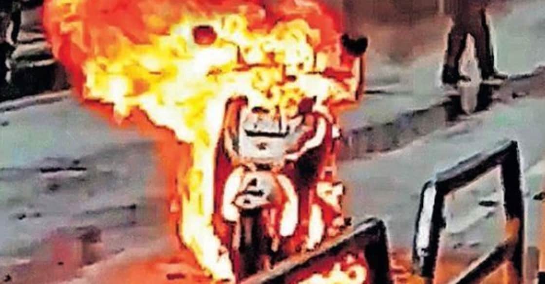scooter-c The scooter engulfed in flames at Cheruthuruthy town. `Photo: Special arrangement