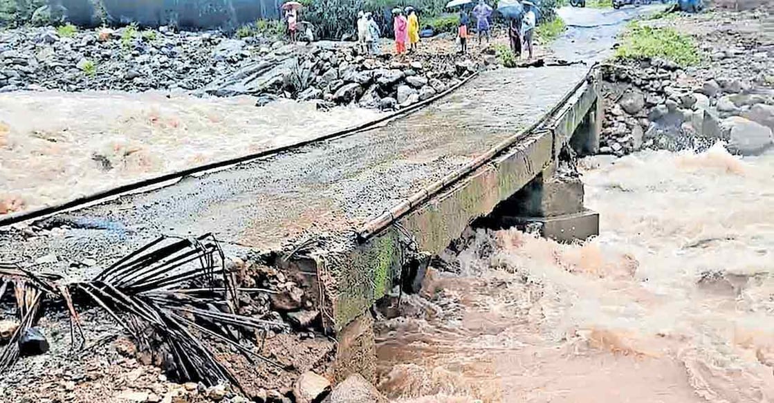 Traffic has been suspended on the Vilangad–Panom–Vayad road, which connects Vanimel and Naripatta panchayats, after soil erosion washed away the approach road to the bridge. Photo: Manorama