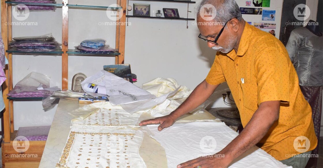Thaha is crafting something not seen in Kochi for nearly half a century — a traditional Jewish wedding dress. Photo: Sudhi Mattanchery/ Manorama.