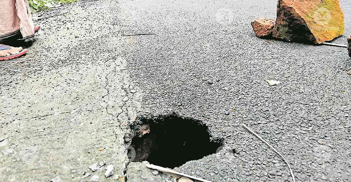 The pothole formed after the culvert on Madayi China Clay Road collapsed. Photo: Special arrangement