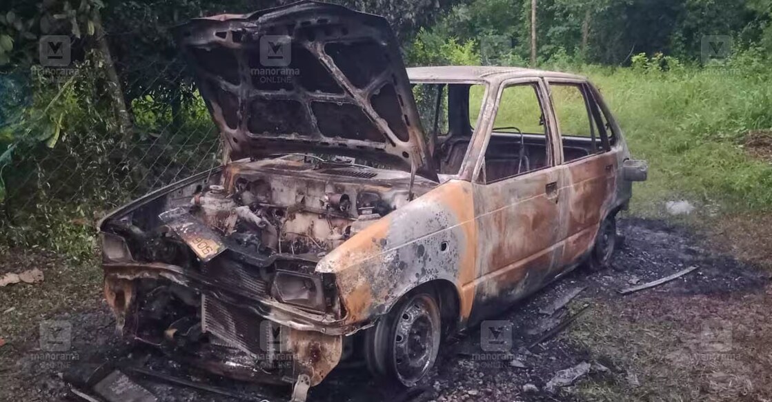 The car that caught fire in Palakkad on Friday, July 11, 2025. Photo: Manorama