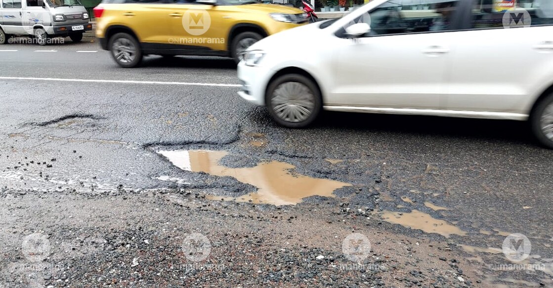 The potholes in the MC Road section at Caritas Junction. Photo: Onmanorama