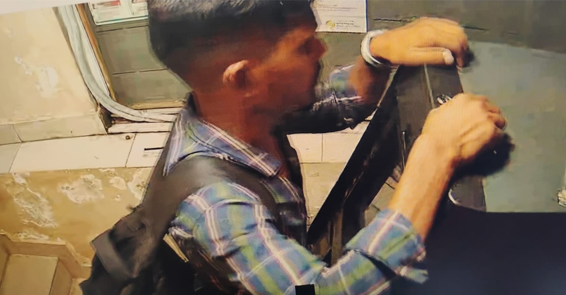 atm-robbery-attempt-sunil-naik-thrissur Sunil Naik attempting to rob the ATM. Photo: Special arrangement