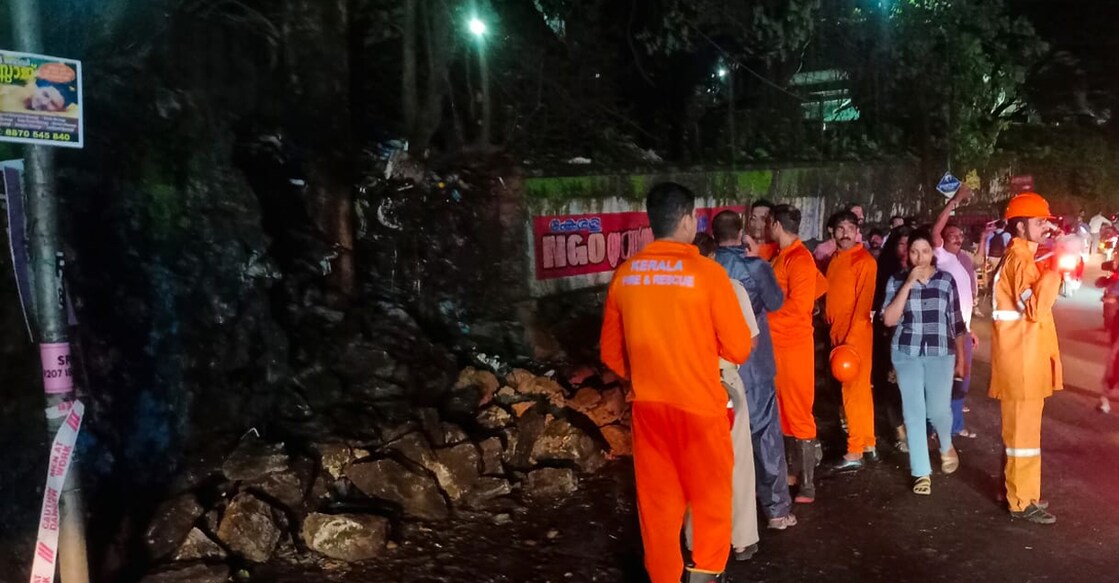 Fire and Rescue Services personnel near the collapsed wall of Kozhikode Medical College Hospital. Photo: Special arrangement