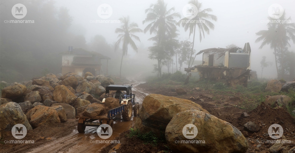 A tractor carrying huge rocks to clear the road in landslide-affected areas of Wayanad. Photo: Albin Mathew