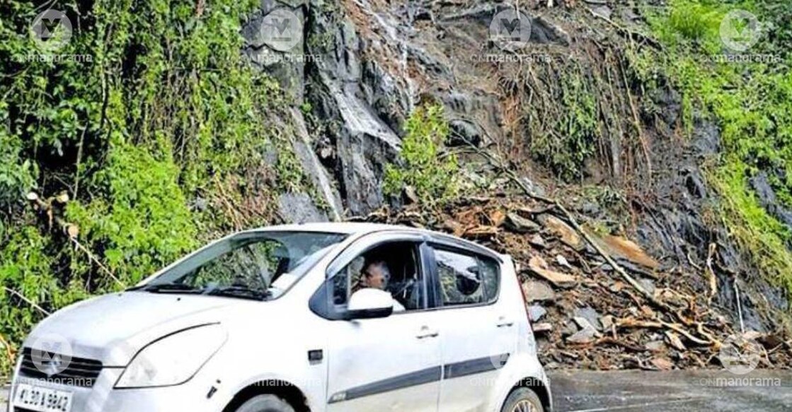 A vehicle passes through the mudslide-hit Thamarassery ghat road. Photo: Manorama
