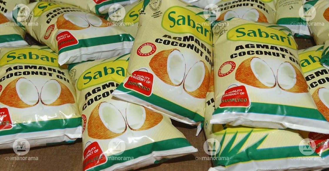 Coconut oil of Sabari band in Supplyco: Manorama Archives