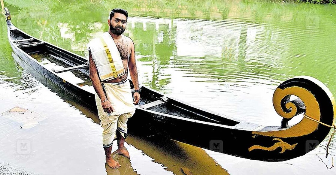 Anoop Narayana Bhattathiri near the Churulan Vallam on which he set sail to Aranmula on Tuesday. Photo: Special arrangement