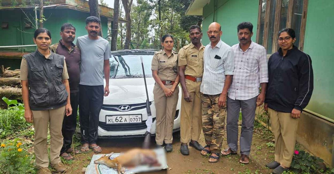 Forest department personnel with deer carcass. Photo: Special arrangement