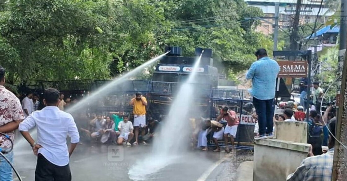 Police use water cannon against Youth Congress workers in Palakkad. Photo: Manorama