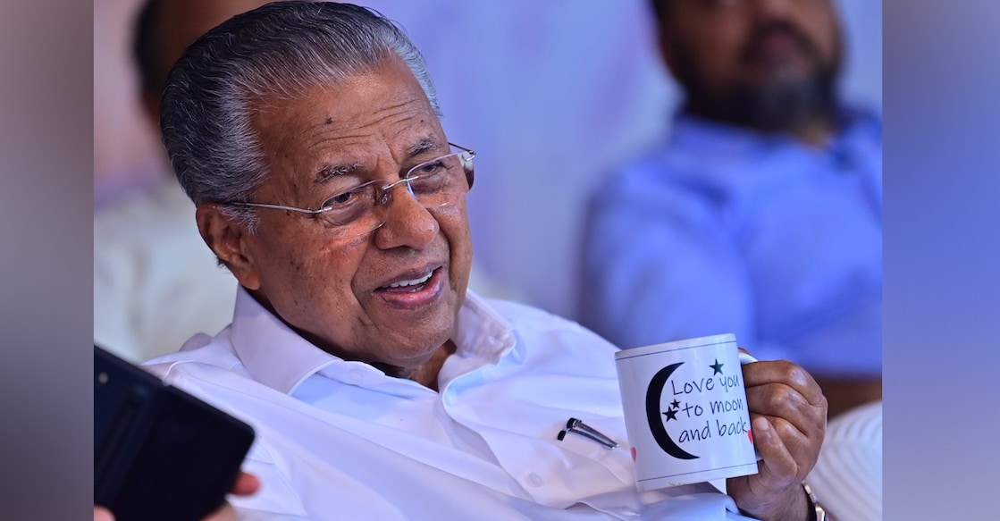 CM Pinarayi Vijayan holding the cup with the words 'Love you to moon and back' written on it. Photo: Facebook/ V Sivankutty