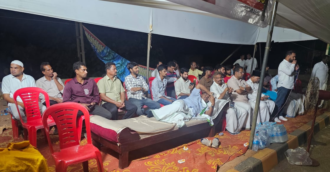 Manjeshwar MLA A K M Ashraf and action committee members protesting against the  NHAI toll plaza in Kumbla. Photo: Special arrangement