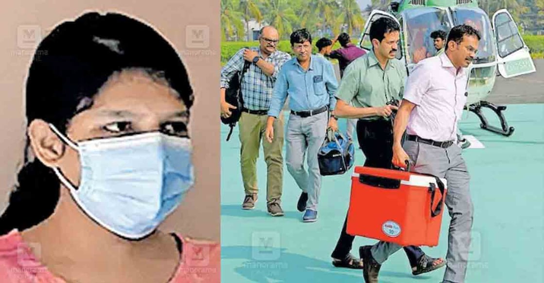Doctors carry the donor heart of Kollam native Shibu in a special container as they arrive in an air ambulance for the heart transplant surgery of Durga Kami at Ernakulam General Hospital. Photo: Manorama