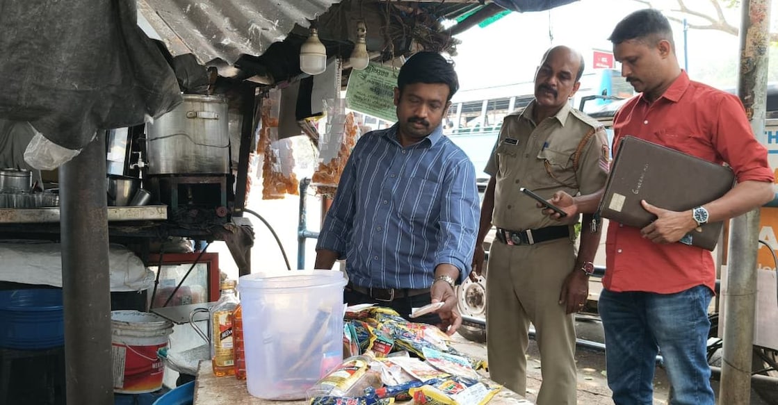 During the inspection, officials seized nearly six kilograms of banned tobacco products and liquor bottles stocked for sale. Photo: Special Arrangement