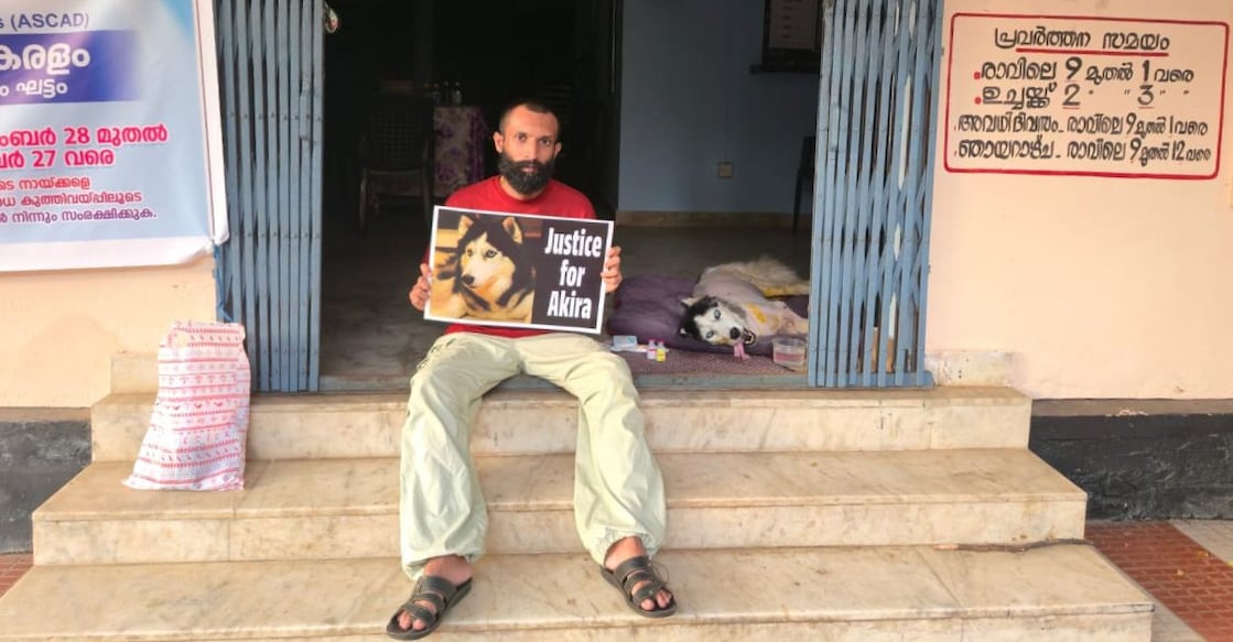 Vishnu Prasad, along with his pet dog Akira, protests at the government veterinary polyclinic in North Paravur in Kochi. Photo: Special arrangement