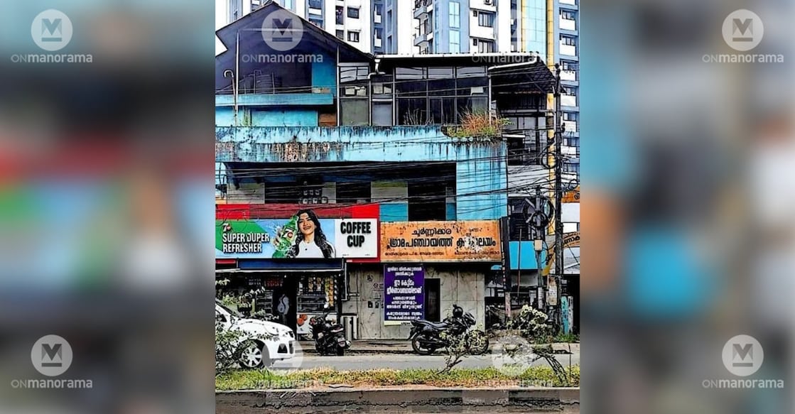 The old Choornikkara Panchayat Office building along the national highway, with a visible danger warning sign. Photo: Special arrangement